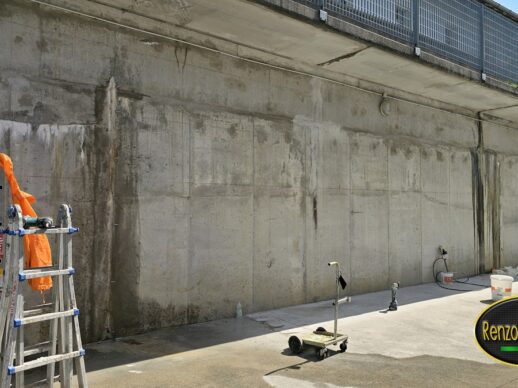 Cantiere di iniezione resine su muro contro terra, iniettori montati